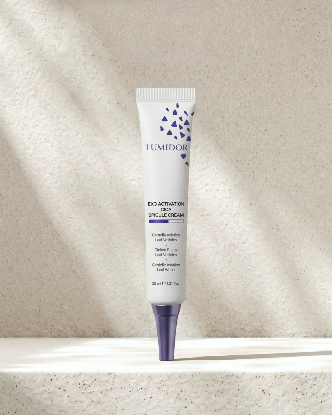 Lumidor Exo Activation Cell Spicule Cream tube on a textured beige background
