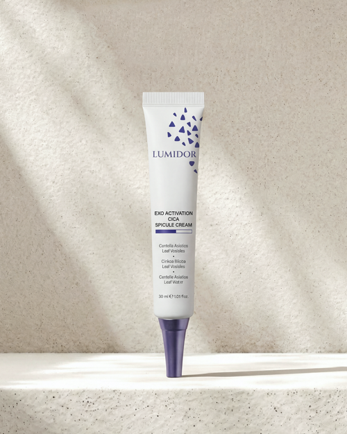 Lumidor Exo Activation Cell Spicule Cream tube on a textured beige background